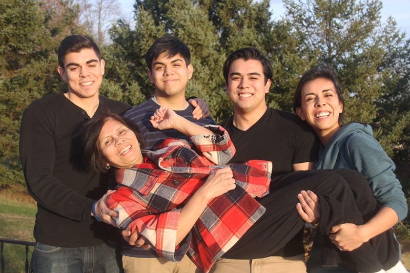 Luke Patterson with his siblings and their mom.